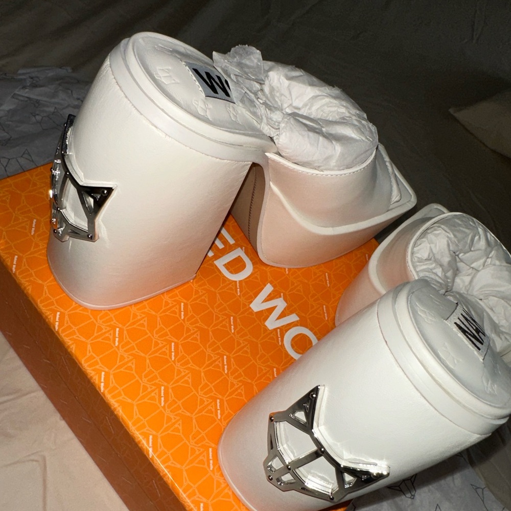 Naked Wolfe platform heels in the style “Jenna” no longer available. Brand new